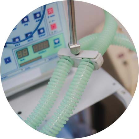 Medical device with buttons and tubs close-up in hospital ward